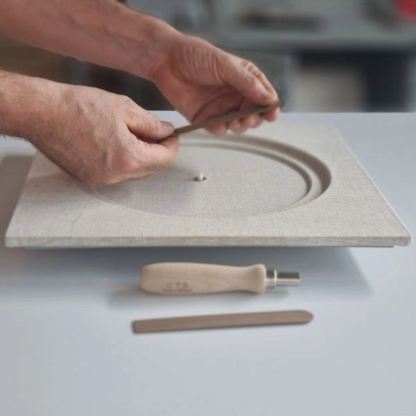 KAM 1 Limited Edition handcrafted in the CalleaDesign atelier, with natural linen surface