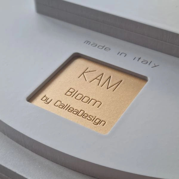 Engraved KAM Bloom by CalleaDesign signature and Made in Italy detail on the back of the wall clock