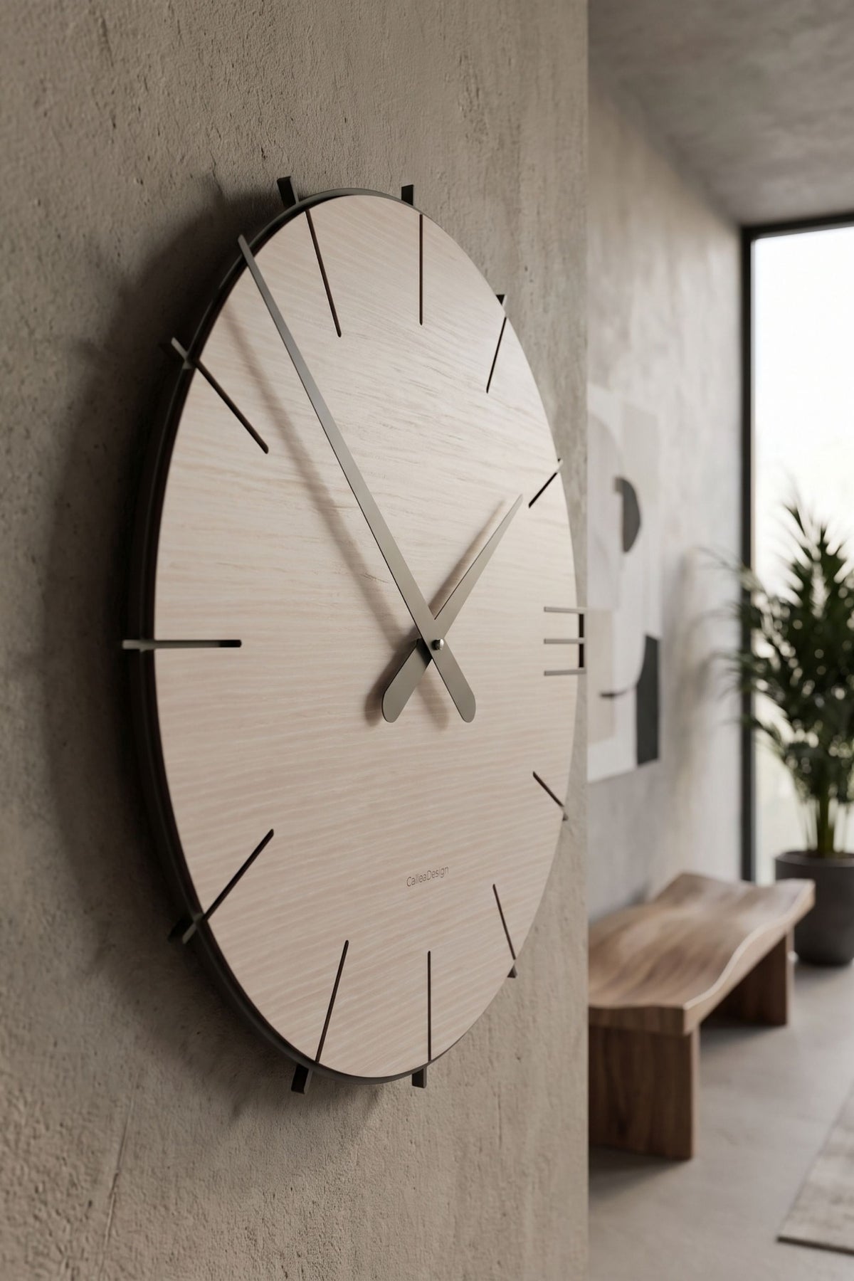 CalleaDesign Mike wall clock in Pickled Oak finish, side view in a modern interior